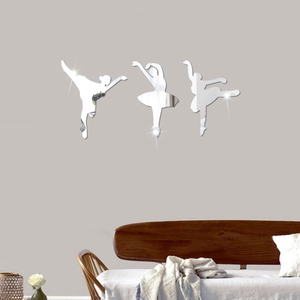 Three acrylic ballerina mirror wall stickers reflecting light on a modern grey home wall