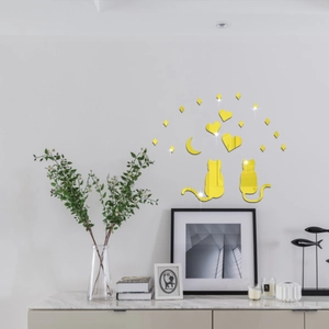 Detail of 3D yellow acrylic mirror wall stickers featuring cats, hearts and moon decor