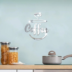 Detail showing reflective mirror coffee cup wall decal on a modern kitchen wall