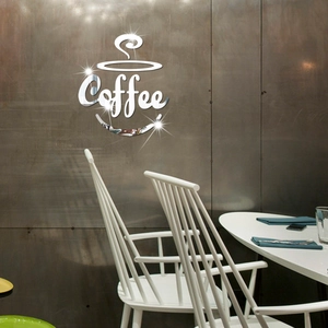 Detail of silver mirror acrylic coffee wall stickers with reflective surface on grey wall