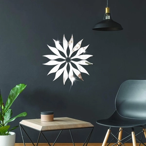 Detailed view of silver sunburst acrylic mirror wall stickers in a modern living room