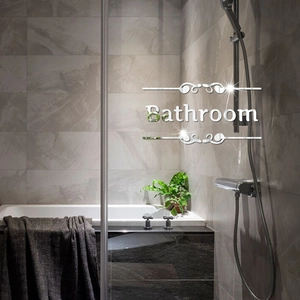 Detail of mirror effect Bathroom wall sticker with elegant floral patterns in a bathroom