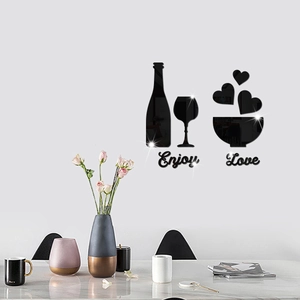 Detail of modern black acrylic wall stickers featuring wine bottles and love heart mirror effect