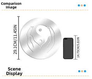 Size comparison of Tai Chi mirror wall sticker measuring 29.1cm next to a smartphone