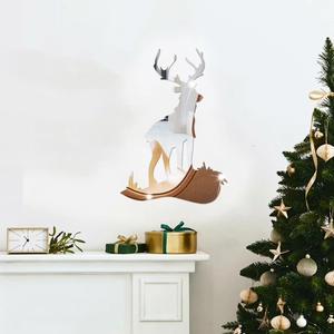 Macro detail of silver 3D deer mirror acrylic wall sticker reflecting living room light