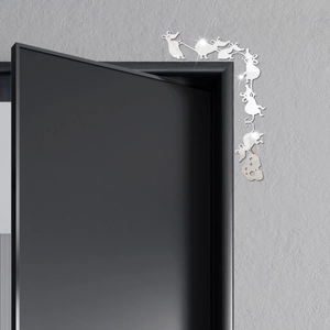 Silver mirror acrylic mouse and cheese wall stickers applied to a black door frame corner