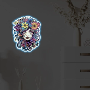 Sticker mural lumineux silhouette femme à fleurs brillant dans une chambre moderne