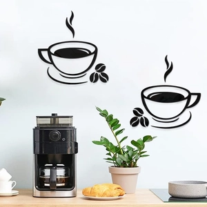 Close-up of 3D black acrylic coffee cup wall stickers with steam and bean patterns