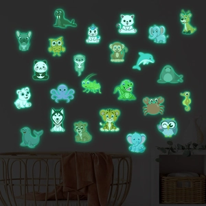 Glow in the dark cartoon animal wall stickers for kids room showing green fluorescence