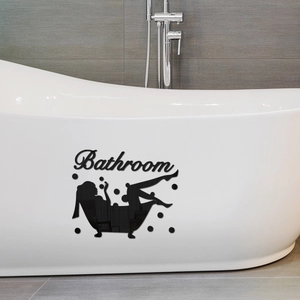 Detail of black acrylic mirror sticker with Bathroom text and bubble silhouette on tub