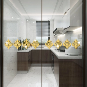 Set of 8 golden acrylic mirror stickers featuring classic fleur-de-lis patterns
