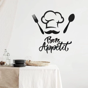 Close-up of black acrylic mirror kitchen wall decal with Bon Appetit text and chef icons