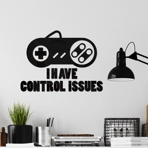 Macro detail of acrylic game controller wall sticker with I Have Control Issues text