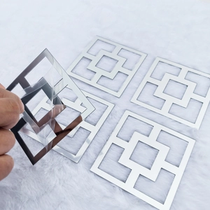 Detail view of silver acrylic mirror wall stickers with geometric Chinese lattice patterns