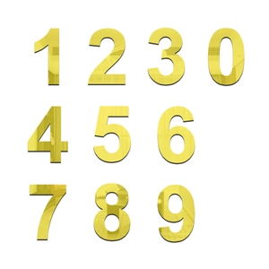 Macro shot of 3D reflective gold acrylic number stickers 0-9 for home wall decor