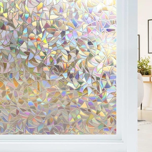 Rainbow geometric stained glass window film providing privacy and colorful sunlight effects