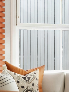 Detail of frosted window film with black vertical stripes for home privacy and decoration