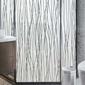 Detailed frosted glass privacy film with dark grey wavy patterns for bathroom decoration
