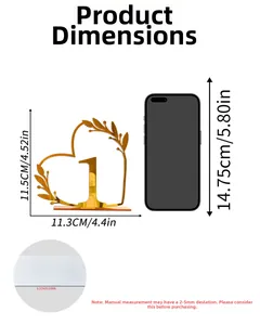 Detailed dimensions of gold acrylic heart table number 1 with size comparison to phone
