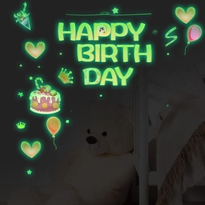 Luminous Happy Birthday wall stickers with glowing stars and cake in dark room