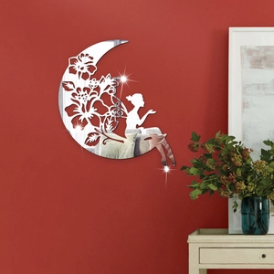 Detailed close-up of acrylic mirror wall sticker featuring a moon and fairy silhouette