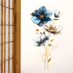 Detail of 3D embossed floral wall sticker with gold accents and blue white petals