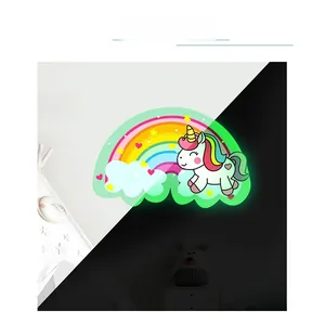 Glow in the dark unicorn wall decals showing day and night luminous effect contrast