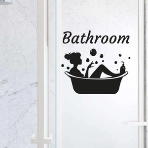 Detail showing a black vinyl bathroom wall sticker with a female silhouette in a bathtub