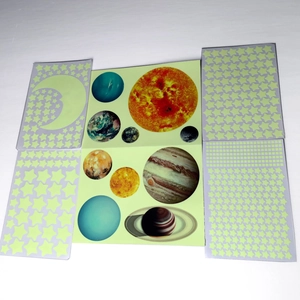 Luminous solar system wall stickers set with glowing stars and colorful planets decal