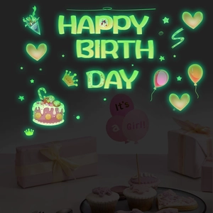 Luminous Happy Birthday wall stickers glowing in the dark with cake and balloon motifs