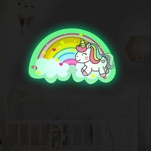 Glow-in-the-dark rainbow unicorn wall sticker with soft green LED light effect for bedroom