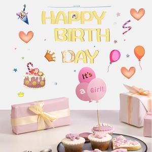 Detailed view of pink party cupcakes with It's a Girl balloon inserts and heart cookies