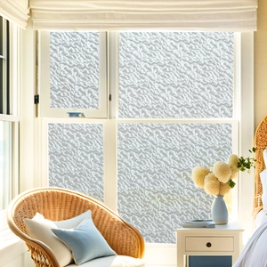 Detailed texture of waterproof frosted window film with pebbles pattern on glass