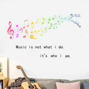 Sticker mural notes de musique arc-en-ciel avec portée et citation pour chambre