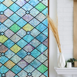 Detail of colorful geometric prism window film showing diamond pattern and rainbow laser effect
