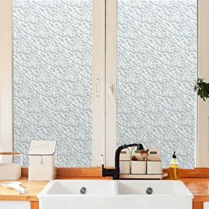 Frosted water ripple window privacy film applied to white kitchen glass frames