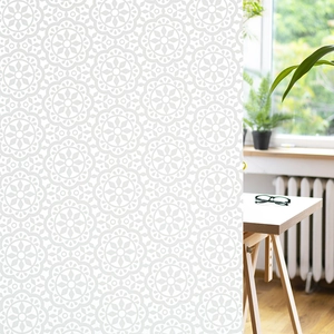 Detail showing grey mandala geometric pattern window film for privacy and office decoration
