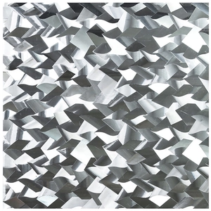 Macro detail of silver geometric 3D pattern on privacy glass film with metallic finish