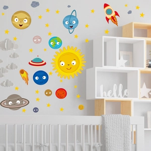 Luminous space wall stickers showing cartoon planets and rockets in a nursery