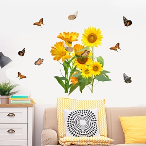 Vibrant sunflower and butterfly wall decals set in a cozy living room interior setup