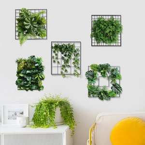 Vertical wall decor set featuring realistic faux plants on black metal mesh grids