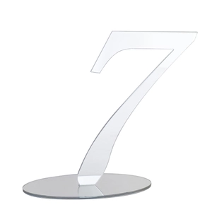 Detailed view of acrylic table number 7 with a circular mirror base for weddings