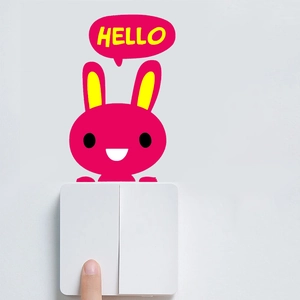 Pink cartoon rabbit wall sticker and Hello speech bubble above a white light switch