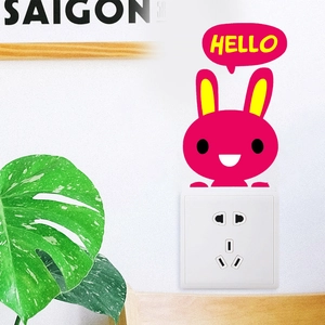 Cartoon rabbit light switch sticker with Hello bubble in vibrant pink for room decor