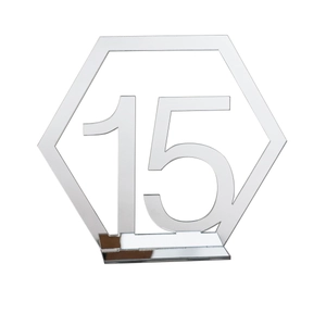 Macro view of silver acrylic hexagon table number fifteen with reflective mirror finish