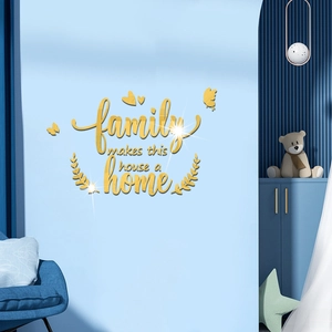 Detail view of 3D acrylic mirror wall stickers with golden family quotes and butterflies