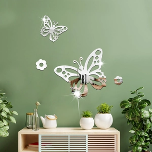 Vue détaillée des stickers muraux miroirs 3D papillon et fleur en acrylique argenté