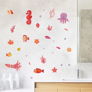 Detailed close-up of cartoon sea life wall stickers with seahorse and octopus on bathroom wall