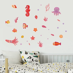 Luminous ocean themed wall stickers featuring cartoon octopus and sea life in a nursery