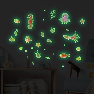 Glow in the dark ocean wall stickers featuring luminous sea creatures and coral for kids room